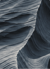 Layered blue-grey textures in close view